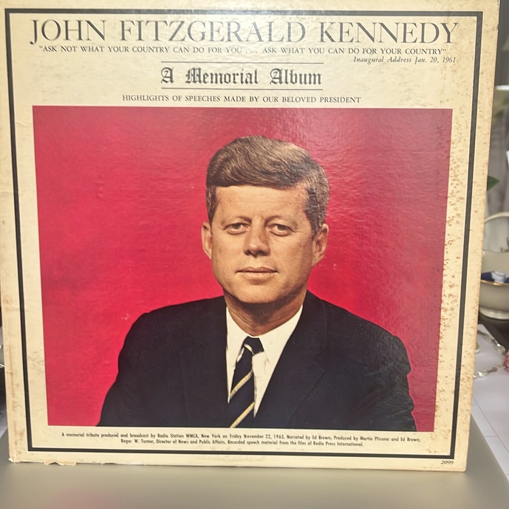 JFK.  A memorial album Vinyl recording has no visible evidence of scratches.